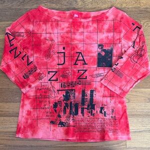 🎶 Women’s boatneck 3/4 sleeve top with jazz pattern. Size L.